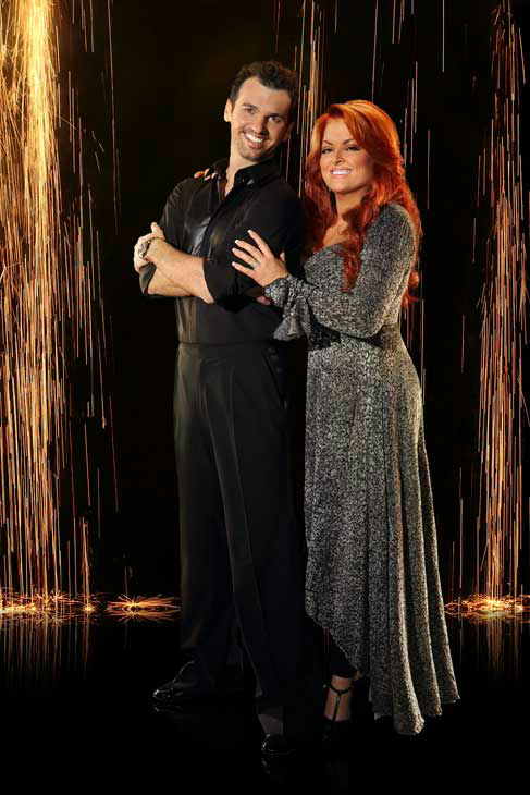 Wynonna Judd and partner Tony Dovolani appear in...