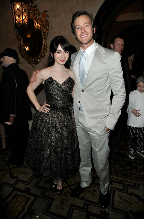 Lily Collins and actor Armie Hammer Armie Hammer attend the after party for the premiere of 'Mirror Mirror' at the Roosevelt Hotel on March 17, 2012 in Hollywood, California. Collins plays Snow White and Hammer plays Prince Charming.