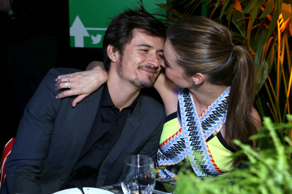 Victoria's Secret supermodel Miranda Kerr and husband and actor Orlando Bloom attend Global Green USA's 10th annual Pre-Oscars Party at the Avalon club in Hollywood, California on Feb. 20, 2013.