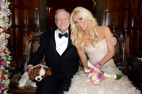 Hugh Hefner and Crystal Harris pose with their...