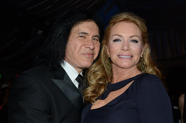 KISS rocker Gene Simmons and partner an Playboy...