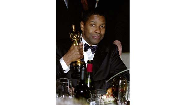 Winner of the Best Actor Academy Award for his performance in 'Training Day', Denzel Washington poses for a photo at the Govenor's Ball after the 74th Annual Academy Awards, Sunday March 24, 2002.