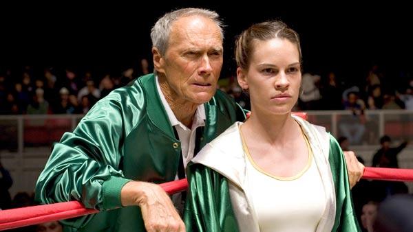 In this promotional photo released by Warner Bros. Pictures, actor and director Clint Eastwood, left, and actress Hilary Swank appear in a scene from 