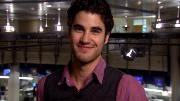 Glee star Darren Criss dishes on his new openly gay role on the show, whether or not hes a love interest for Kurt, played by Chris Colfer. - Provided courtesy of KABC Glee star Darren Criss dishes on his new openly gay role on the show, whether or not hes a love interest for Kurt, played by Chris Colfer. - Provided courtesy of KABC