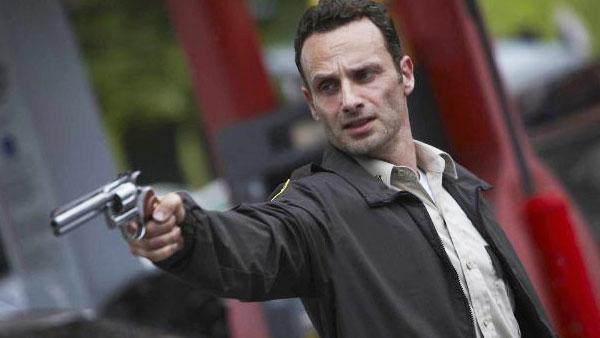 A promotional still of Andrew Lincoln holding a gun as Rick Grimes from The Walking Dead television series. - Provided courtesy of AMCtv.com/ Scott Garfield A promotional still of Andrew Lincoln holding a gun as Rick Grimes from The Walking Dead television series. - Provided courtesy of AMCtv.com/ Scott Garfield