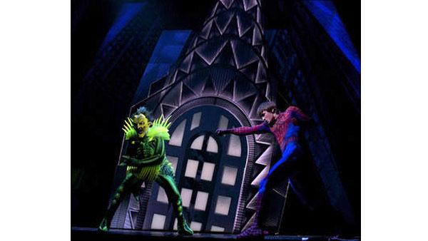 The Green Goblin (Patrick Page) duels Spider-Man (Reeve Carney) atop the Chrysler Building in a scene from 'Spider-Man: Turn off the Dark', the Broadway musical.