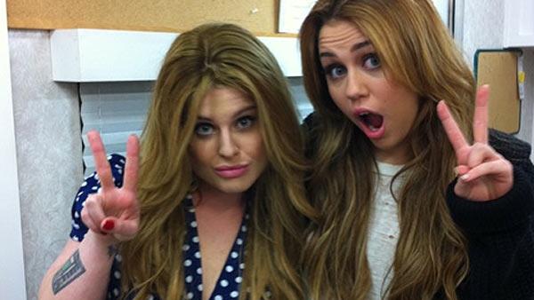 Kelly Osbourne and Miley Cyrus don matching hairstyles in a photo posted on Osbournes Twitter page on Dec. 22, 2010. - Provided courtesy of http://plixi.com/p/64761684 Kelly Osbourne and Miley Cyrus don matching hairstyles in a photo posted on Osbournes Twitter page on Dec. 22, 2010. - Provided courtesy of http://plixi.com/p/64761684