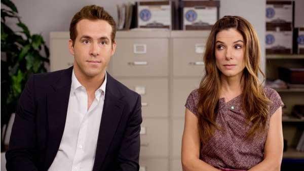 Ryan Reynolds and Sandra Bullock in a production still from the 2009 film The Proposal - Provided courtesy of Touchstone Pictures