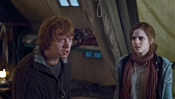 Rupert Grint (Ron Weasley) and Emma Watson (Hermione Granger) appear in a scene from Harry Potter and the Deathly Hallows. - Provided courtesy of Warner Bros. Rupert Grint (Ron Weasley) and Emma Watson (Hermione Granger) appear in a scene from Harry Potter and the Deathly Hallows. - Provided courtesy of Warner Bros.