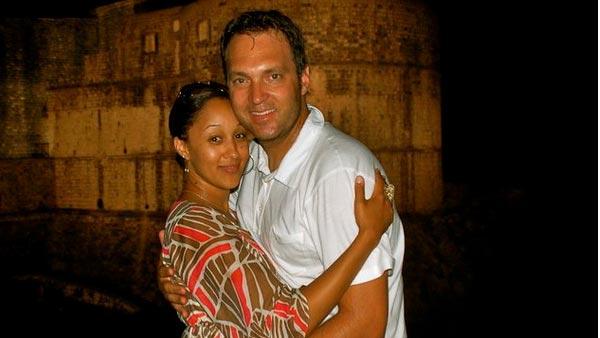 Tamera Mowry and fiance Adam Housley in a July 2010 photo from her Twitter page. - Provided courtesy of Twitpic.com/photos/TameraMowryTwo
