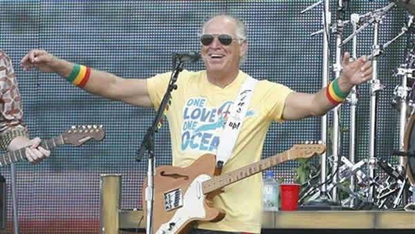Jimmy Buffett performs Sunday, July 11, 2009 in Gulf Shores, Ala. - Provided courtesy of AP / Chip English Jimmy Buffett performs Sunday, July 11, 2009 in Gulf Shores, Ala. - Provided courtesy of AP / Chip English