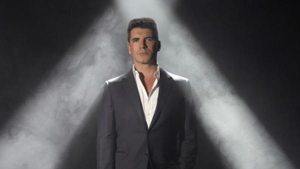 Simon Cowell appears in a promotional photo for the FOX series The X Factor. - Provided courtesy of Ian Derry / FOX Simon Cowell appears in a promotional photo for the FOX series The X Factor. - Provided courtesy of Ian Derry / FOX