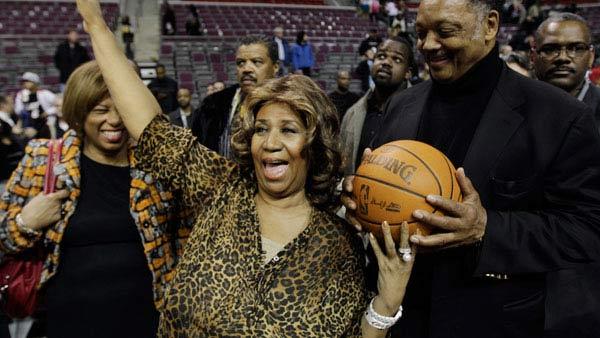 Aretha Franklin walks on the court with Jesse Jackson after the Detroit Pistons-Miami Heat NBA basketball game in Auburn Hills, Mich., Friday, Feb. 11, 2011. - Provided courtesy of AP / AP Photo/Paul Sancya Aretha Franklin walks on the court with Jesse Jackson after the Detroit Pistons-Miami Heat NBA basketball game in Auburn Hills, Mich., Friday, Feb. 11, 2011. - Provided courtesy of AP / AP Photo/Paul Sancya