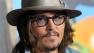 Johnny Depp arrives at the premiere of the animated feature film 