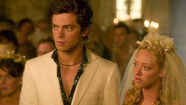 Amanda Seyfried and Dominic Cooper met on the set of the 2008 film Mamma Mia! and dated for about three years. They split around May 2010. Seyfried told Elle magazine in its April 2011 issue that he broke her heart. - Provided courtesy of Universal Pictures / Relativity Media Amanda Seyfried and Dominic Cooper met on the set of the 2008 film Mamma Mia! and dated for about three years. They split around May 2010. Seyfried told Elle magazine in its April 2011 issue that he broke her heart. - Provided courtesy of Universal Pictures / Relativity Media