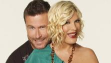 Tori Spelling and Dean McDermott appear in a still from Tori and Dean: Inn Love. - Provided courtesy of Oxygen Network