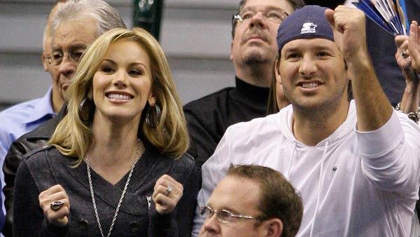 Dallas Cowboys quarterback Tony Romo, right, reacts to a shot by the Dallas Mavericks as he and his fiancee, Candice Crawford, left, take in the Mavericks NBA basketball game against the Los Angeles Lakers on Wednesday, Jan. 19, 2011, in Dallas. - Provided courtesy of AP / AP Photo/Tony Gutierrez Dallas Cowboys quarterback Tony Romo, right, reacts to a shot by the Dallas Mavericks as he and his fiancee, Candice Crawford, left, take in the Mavericks NBA basketball game against the Los Angeles Lakers on Wednesday, Jan. 19, 2011, in Dallas. - Provided courtesy of AP / AP Photo/Tony Gutierrez