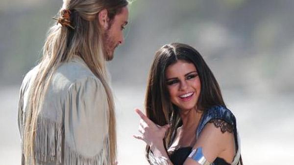 Selena Gomez appears with an unidentifed man while filming the video for her track Love You Like a Love Song in May 2011. - Provided courtesy of selenagomez.com Selena Gomez appears with an unidentifed man while filming the video for her track Love You Like a Love Song in May 2011. - Provided courtesy of selenagomez.com