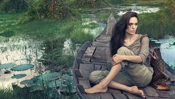 Angelina Jolie appears in a photo touting fashion giant Louis Vuitton 2011 Core Values campaign. - Provided courtesy of Louis Vuitton / Annie Leibovitz Angelina Jolie appears in a photo touting fashion giant Louis Vuitton 2011 Core Values campaign. - Provided courtesy of Louis Vuitton / Annie Leibovitz