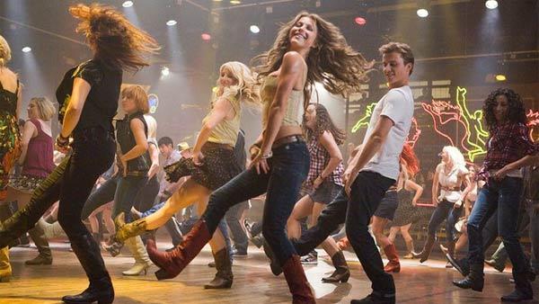 Kenny Wormald and Julianne Hough appear in a scene from the 2011 movie Footloose. - Provided courtesy of Paramount Pictures Kenny Wormald and Julianne Hough appear in a scene from the 2011 movie Footloose. - Provided courtesy of Paramount Pictures