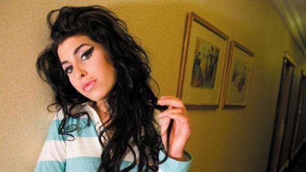  Amy Winehouse appears in an undated posted on her official website.