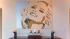 A painting of Anna Nicole Smith appears inside the Hollywood Hills home of the late actress. The 5-bedroom house was listed for sale for $1.75 million in late July 2011. - Provided courtesy of Teri Pacitto, Aviara Real Estate