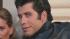 Travolta in Grease on the left, the actor in the 2009 film Old Dogs on the right.