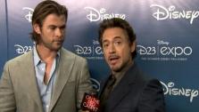 Robert Downey Jr. and Chris Hemsworth talk to OnTheRedCarpet.com about the upcoming Avengers film at D23. - Provided courtesy of OTRC