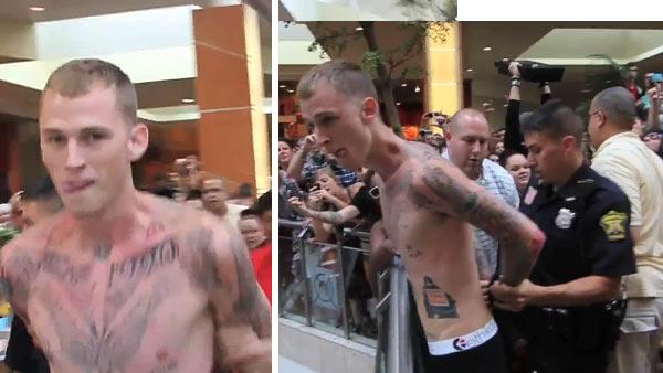 Machine Gun Kelly is seen being detained at Westfield SouthPark mall in Strongsville, Ohio on Aug. 20, 2011. - Provided courtesy of youtube.com/user/machinegunkellyAK / youtube.com/user/danielle843l Machine Gun Kelly is seen being detained at Westfield SouthPark mall in Strongsville, Ohio on Aug. 20, 2011. - Provided courtesy of youtube.com/user/machinegunkellyAK / youtube.com/user/danielle843l
