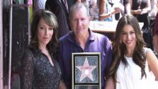 Ed ONeill appears between actress Katey Sagal, who played his wife on Married With Children, and Sofia Vergara, who plays his spouse on Modern Family at his Hollywood star ceremony on Aug. 30, 2011. - Provided courtesy of OTRC