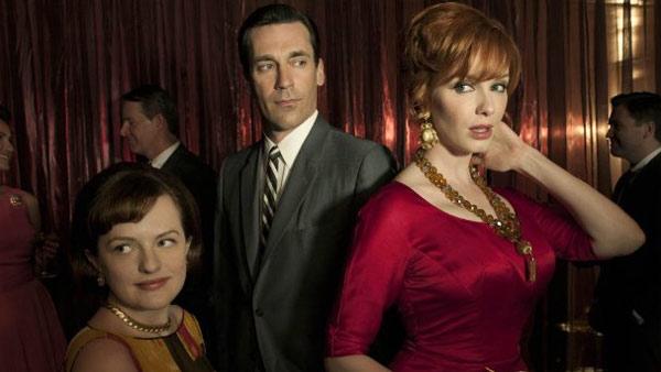 Elisabeth Moss, Jon Hamm and Christina Hendricks appear in a promotional photo for the AMC series Mad Men. - Provided courtesy of AMC Elisabeth Moss, Jon Hamm and Christina Hendricks appear in a promotional photo for the AMC series Mad Men. - Provided courtesy of AMC