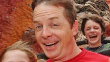 In this photo supplied by Walt Disney World, actor Michael J. Fox, center, enjoys Splash Mountain at the Magic Kingdom with his twin daughters, son and his wife, actress Tracy Pollan on Friday, March 25, 2005. - Provided courtesy of Walt Disney Company