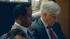 Dr. Conrad Murray looks down as Deputy District...