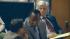 Dr. Conrad Murray speaks to one of his attorneys...