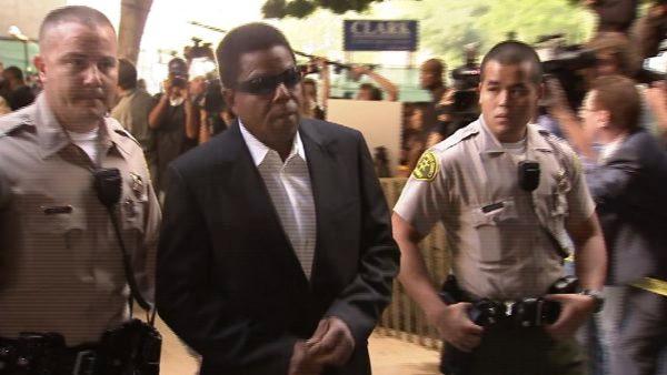 Michael Jackson's brother Tito Jackson, center, arrives to court for the trial of Conrad Murray on Tuesday, Sept. 27, 2011.