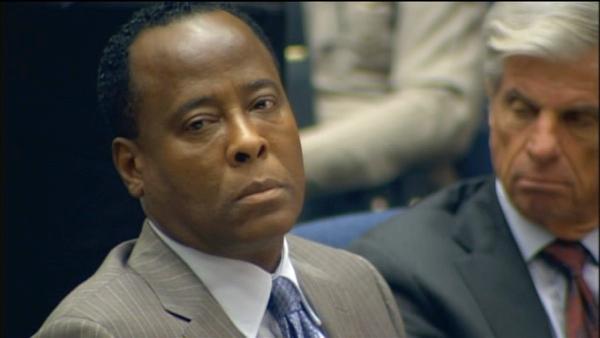 Dr. Conrad Murray listens as Deputy District Attorney David Walgren delivers opening statements on Sept. 27, 2011.