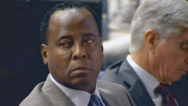 Dr. Conrad Murray listens as Deputy District Attorney David Walgren delivers opening statements in his involuntary manslaughter trial on Tuesday, Sept. 27, 2011 in Los Angeles.