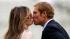 Former cricketer Shane Warne shares a kiss with...