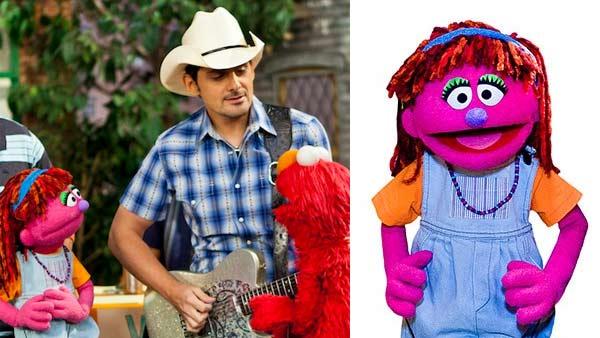 Sesame Street muppet Lily and Elmo with Brad Paisley. - Provided courtesy of Sesame Workshop / PBS Sesame Street muppet Lily and Elmo with Brad Paisley. - Provided courtesy of Sesame Workshop / PBS
