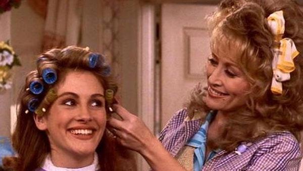 Dolly Parton and Julia Roberts appear in a scene from the 1989 movie Steel Magnolias. - Provided courtesy of Rastar Films / Columbia TriStar Films Dolly Parton and Julia Roberts appear in a scene from the 1989 movie Steel Magnolias. - Provided courtesy of Rastar Films / Columbia TriStar Films