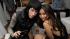Trace Cyrus and Brenda Song appear in a photo...