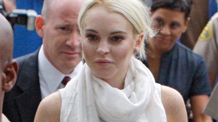 Lindsay Lohan arrives at the Los Angeles Superior Court West District Airport Courthouse Wednesday, Oct. 19, 2011, in Los Angeles.