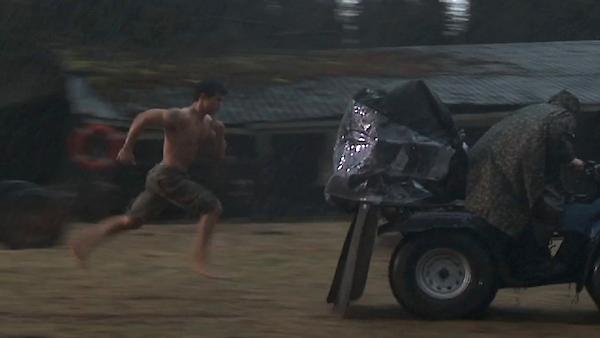 Taylor Lautner runs shirtless in the rain as he shoots a scene for the movie 'The Twilight Saga: Breaking Dawn' in 2011.
