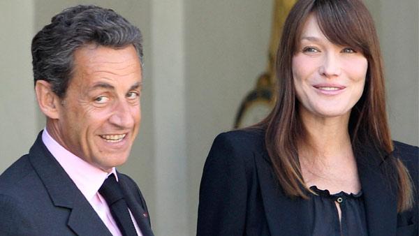 France's President Nicolas Sarkozy and his wife Carla Bruni-Sarkozy appear at the Elysee Palace in Paris on Friday, May 13, 2011.