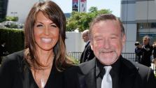 Robin Williams, right, and Susan Schneider arrive at the Creative Arts Emmy Awards on Saturday, Aug. 21, 2010 in Los Angeles. - Provided courtesy of AP / Chris Pizzello