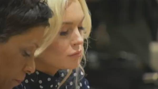 Lindsay Lohan reacts as a judge sentenced her to 30 days in jail for violating her probation. She apppeared at a hearing at a Los Angeles court on Nov. 2, 2011.