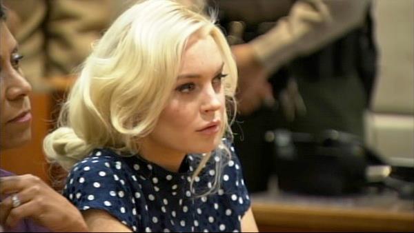 Lindsay Lohan reacts as a judge sentenced her to 30 days in jail for violating her probation. She apppeared at a hearing at a Los Angeles court on Nov. 2, 2011. - Provided courtesy of OTRC Lindsay Lohan reacts as a judge sentenced her to 30 days in jail for violating her probation. She apppeared at a hearing at a Los Angeles court on Nov. 2, 2011. - Provided courtesy of OTRC