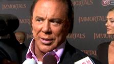 Mickey Rourke talks to OnTheRedCarpet.com at the premiere of Immortals. - Provided courtesy of OTRC
