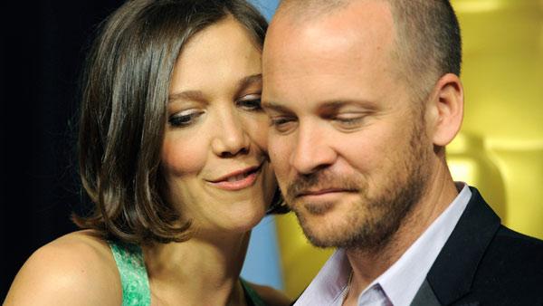 Maggie Gyllenhaal poses with her husband, actor Peter Sarsgaard, at the Academy Awards Nominees Luncheon in Beverly Hills, Calif., Monday, Feb. 15, 2010.