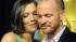 Maggie Gyllenhaal poses with her husband, actor...